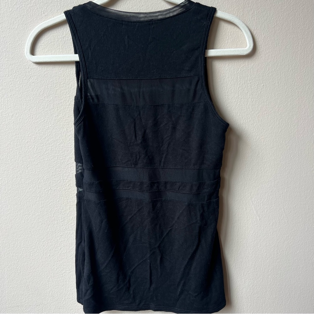 Black women’s tank top with sheer panels